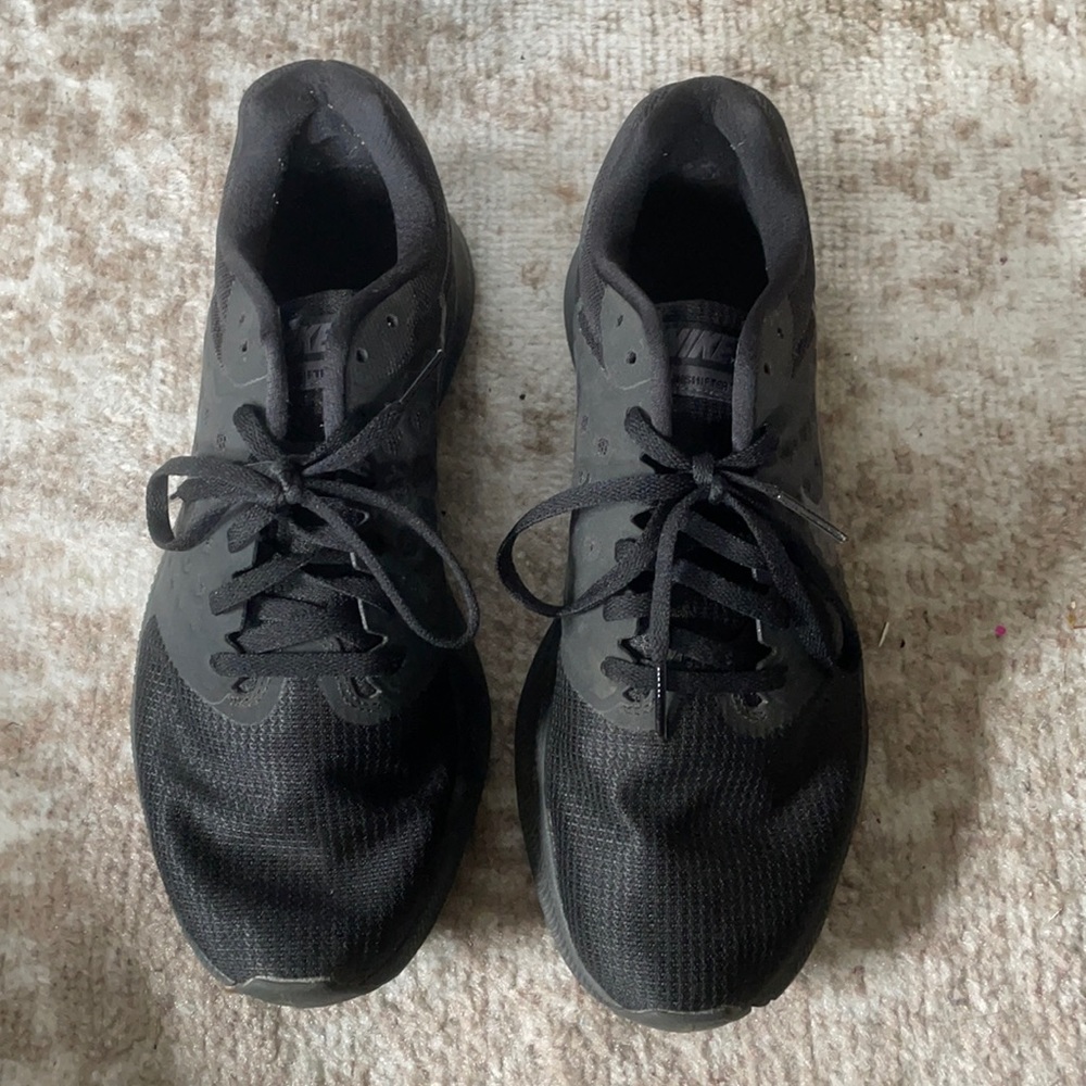 Men or women Black Nike Sneakers